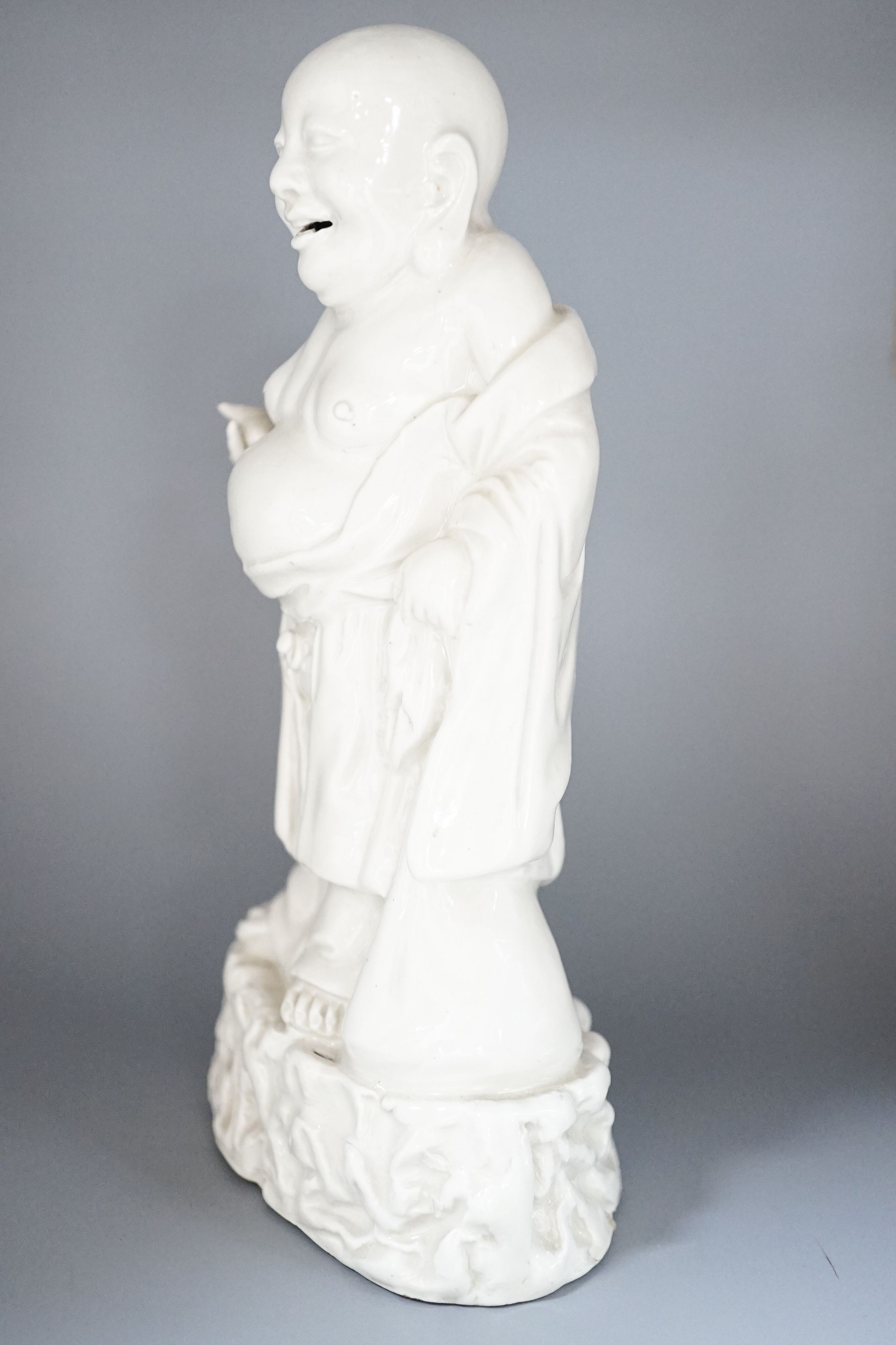 A Chinese blanc-de-chine figure of Budai, 19cm